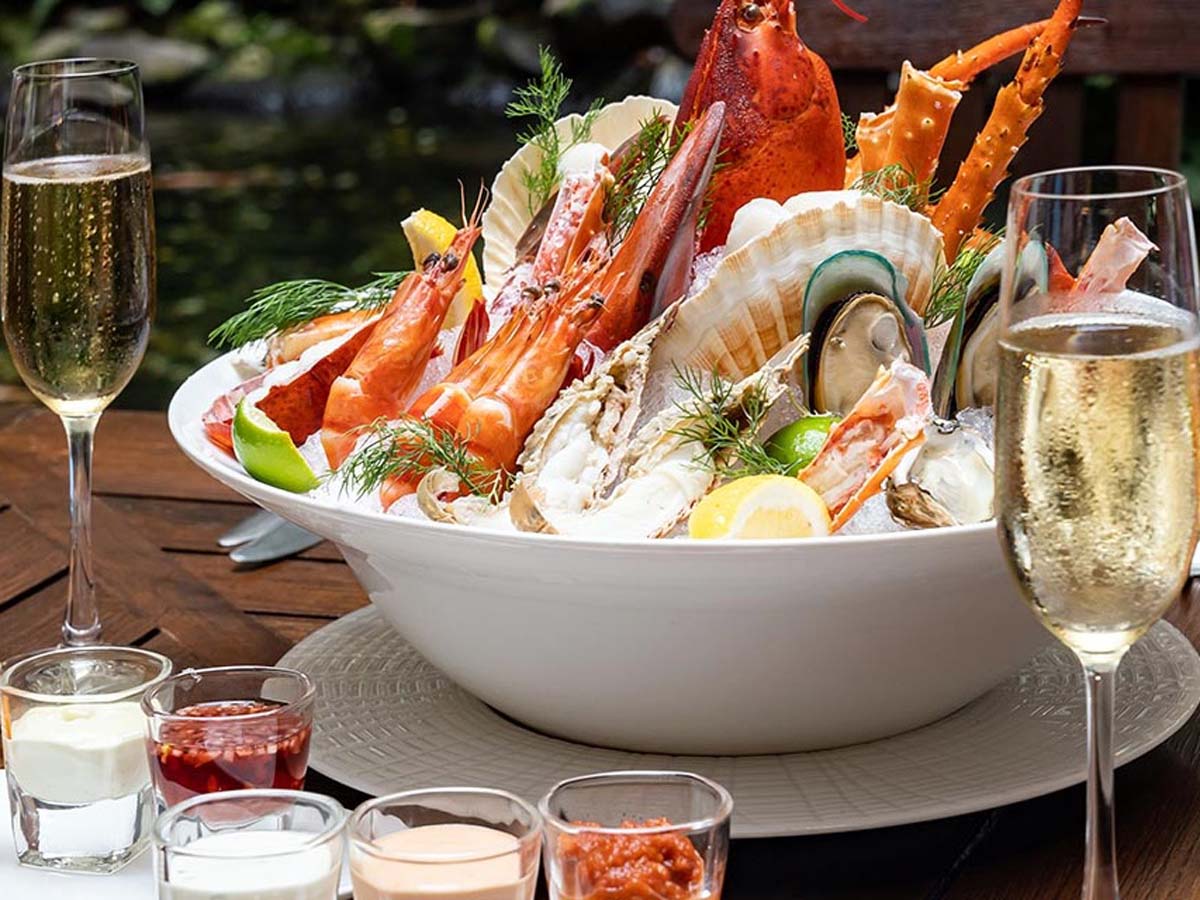 A rich, velvety white Chardonnay cream sauce simmering beautifully in a pan.