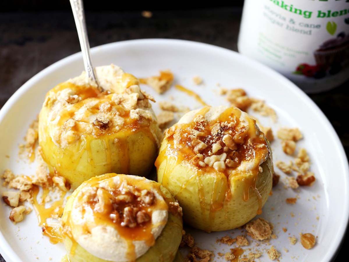 A sweet whole baked apple stuffed with toasted sliced almonds and spices.